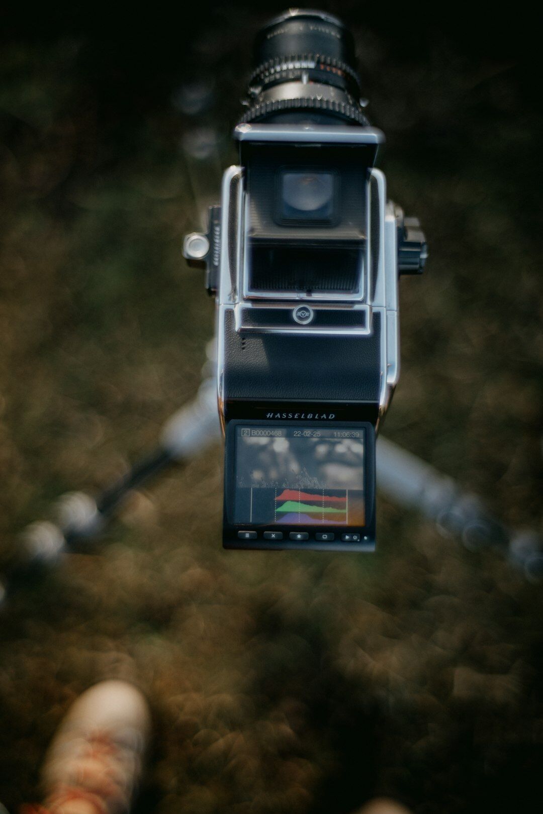 Professional broadcast television camera on a tripod in a studio